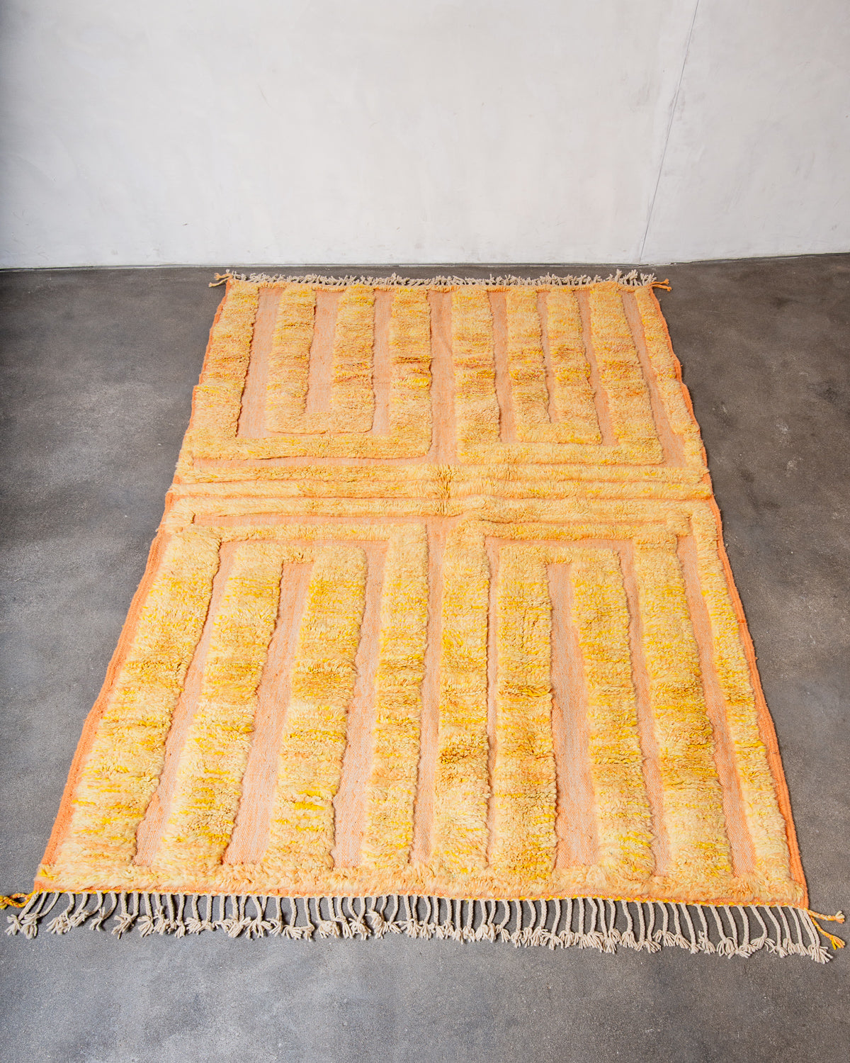 Modern, designer, handcrafted Berber rug from Morocco. Beniourain carpet with beautiful colours and patterns and fluffy wool texture.